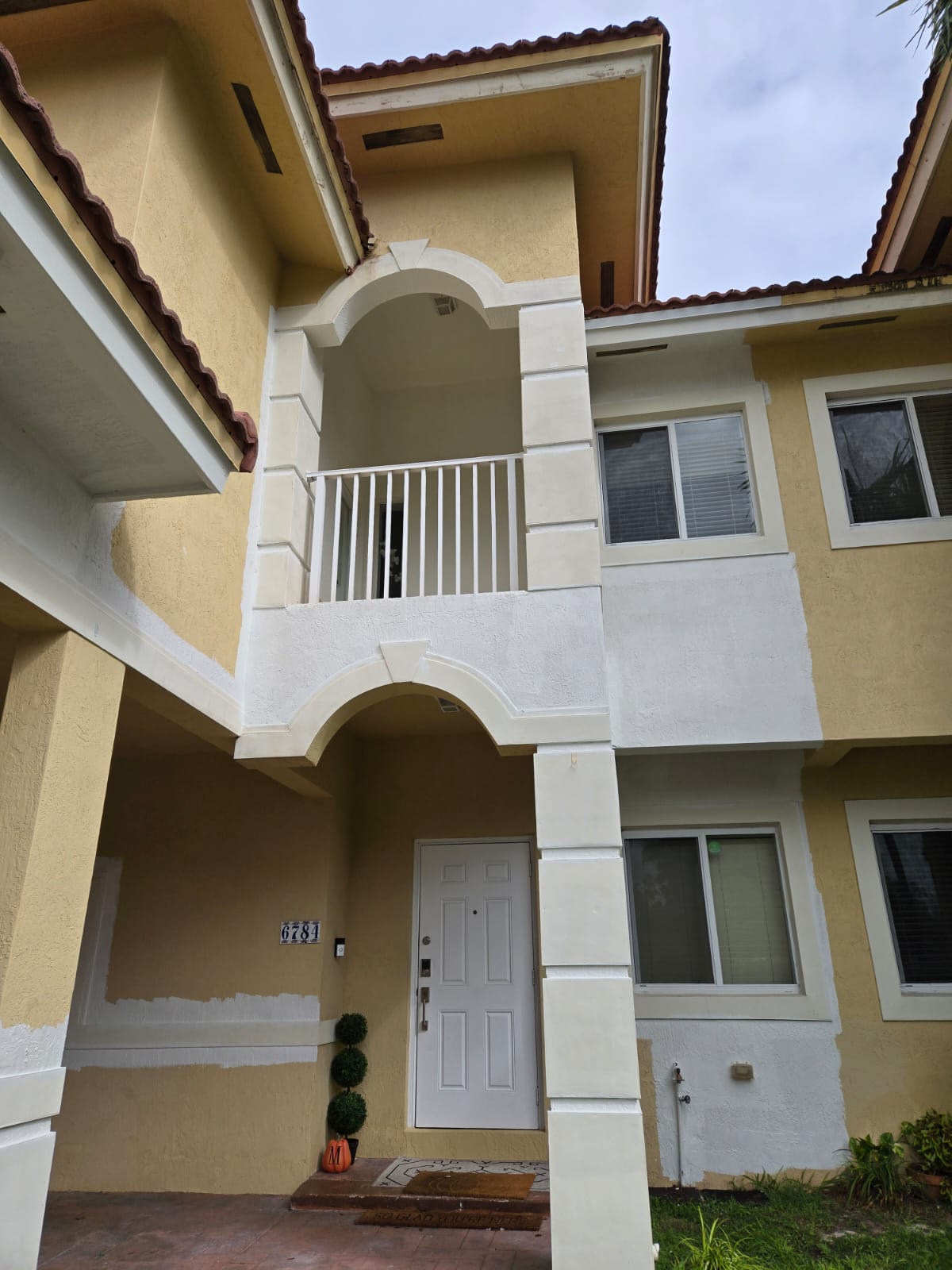 Exterior Modernization with Paint and Floor Repair - 1