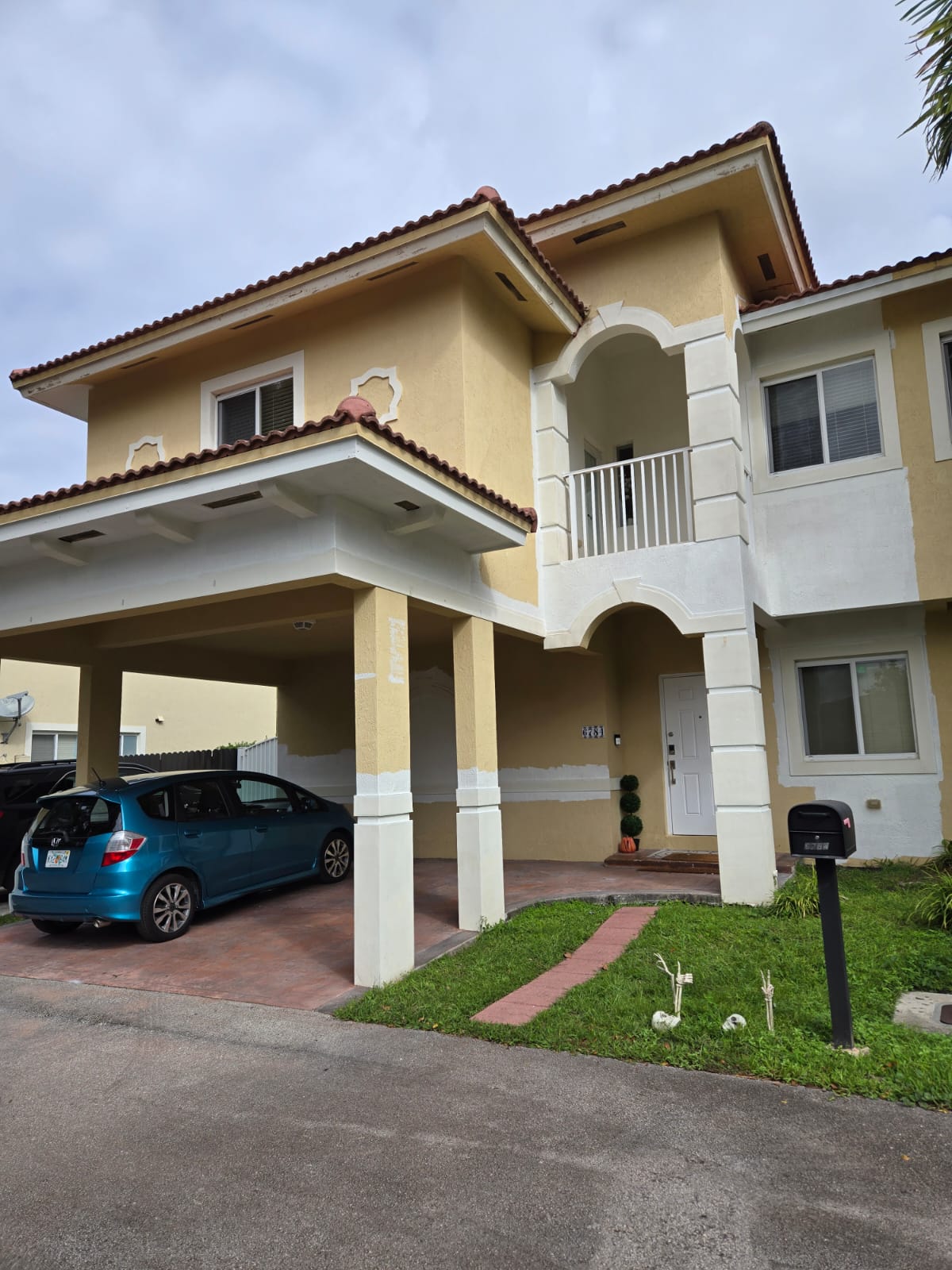 Exterior Modernization with Paint and Floor Repair - 5